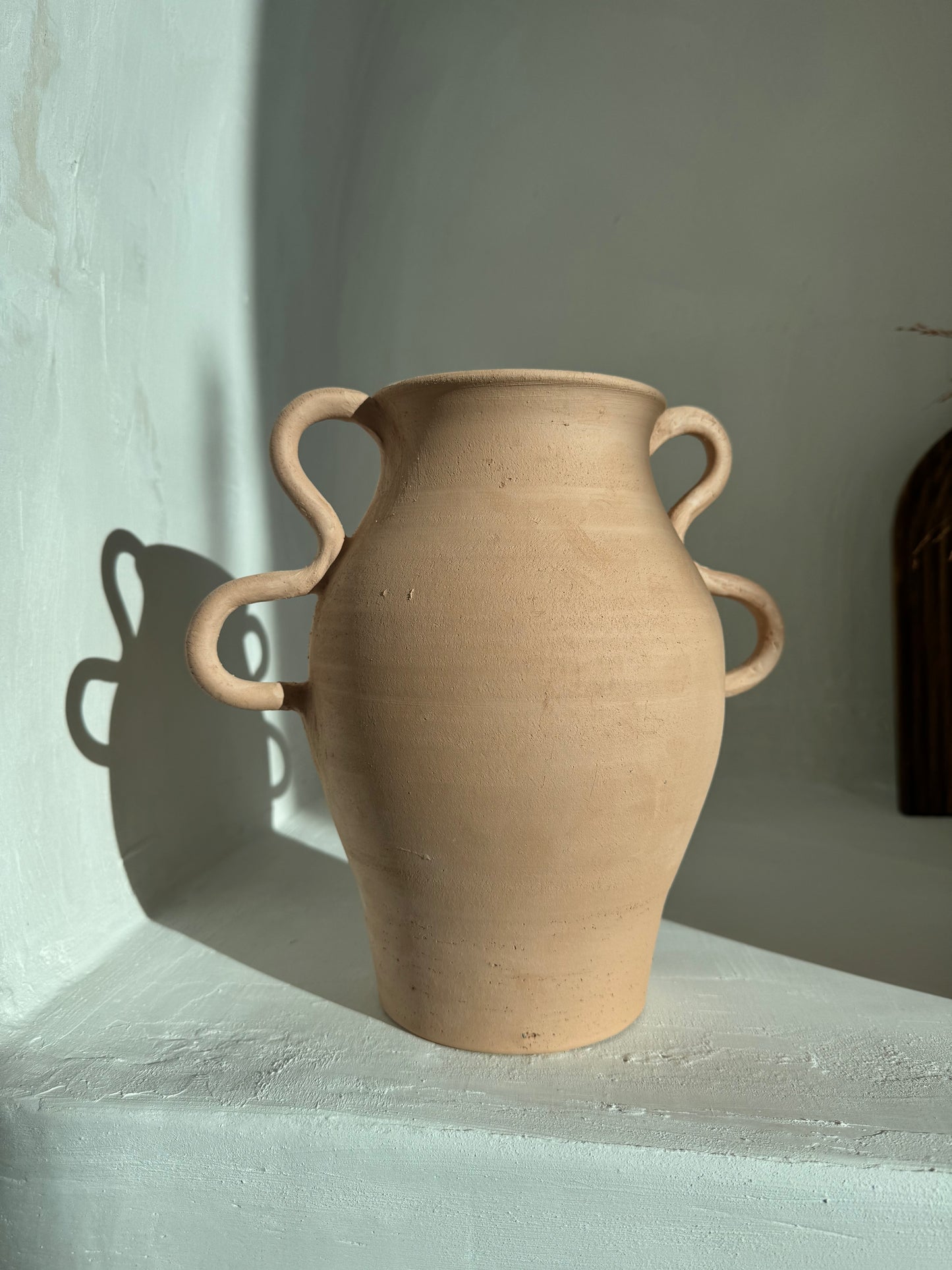 Terracotta vaas met oor